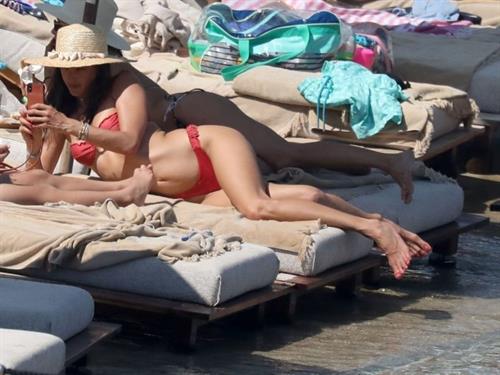 Alessandra Ambrosio perfect model body in a sexy little thong bikini seen at the beach by paparazzi showing nice cleavage and ass.





















