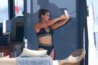 Sam Faiers sexy in a black versace bikini seen by paparazzi showing nice cleavage.






















