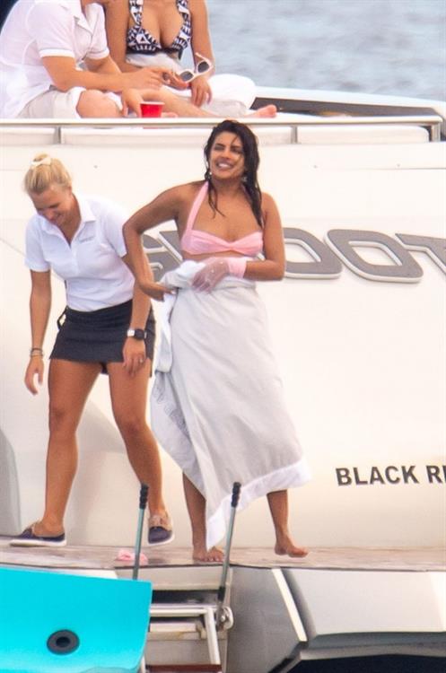 Priyanka Chopra Pictures Priyanka Chopra sexy ass in a bikini partying on a yacht seen by paparazzi.