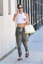Nikki Bella braless boobs in a white top seen by paparazzi showing her tits pokies.





