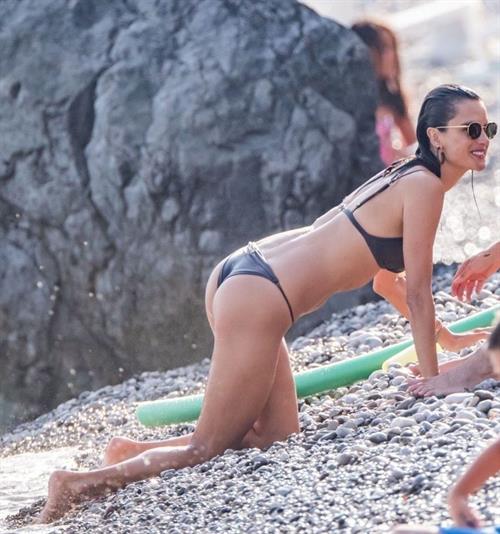 Alessandra Ambrosio sexy at the beach in a thong bikini and flashing her pussy to her boyfriend seen by paparazzi.











