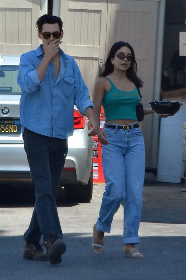 Vanessa Hudgens braless nipples pokies in a green top showing off her tits seen by paparazzi with Austin Butler.


















