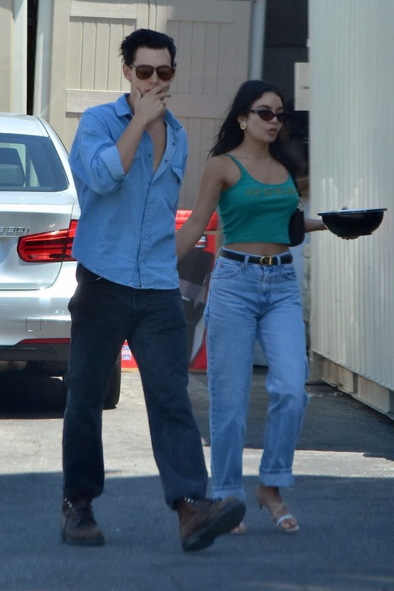 Vanessa Hudgens Pictures Vanessa Hudgens braless nipples pokies in a green top showing off her tits seen by paparazzi with Austin Butler.