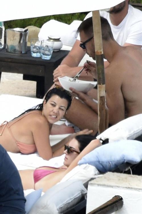Kendall Jenner with Kourtney Kardashian sexy asses in thong bikinis seen by paparazzi.

