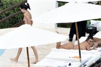Kendall Jenner with Kourtney Kardashian sexy asses in thong bikinis seen by paparazzi.

