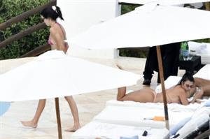 Kendall Jenner with Kourtney Kardashian sexy asses in thong bikinis seen by paparazzi.

