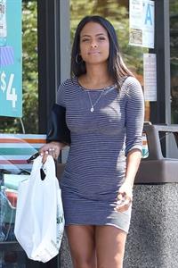 Christina Milian braless tits pokies seen by paparazzi showing her hard nipples through her dress.

