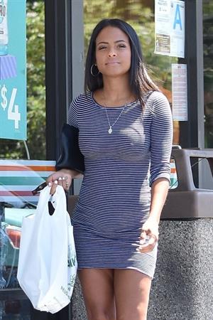 Christina Milian braless tits pokies seen by paparazzi showing her hard nipples through her dress.

