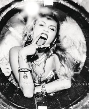 Miley Cyrus Pictures Miley Cyrus nude and sexy photo shoot for Von Magazine showing her topless boobs.