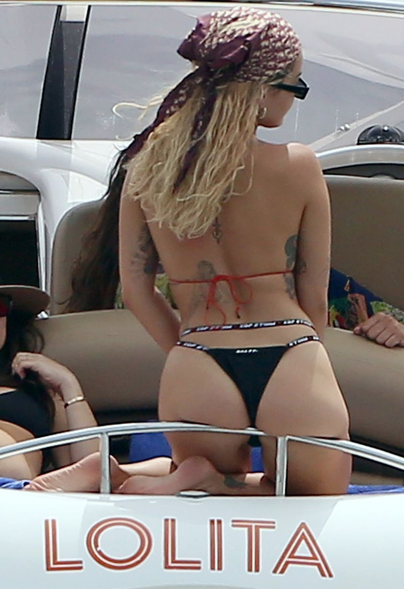 Rita Ora sexy ass in a thong bikini seen by paparazzi.
