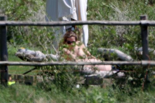 Alejandra Silva caught topless with her nude boobs exposed by paparazzi on vacation.
