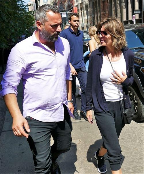 Lisa Rinna braless tits in a white top showing her boobs seen by paparazzi.












