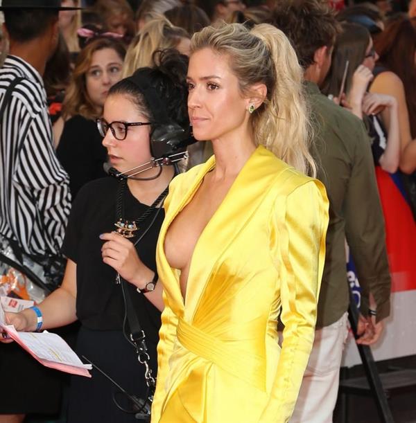 Kristin Cavallari nip slip wardrobe malfunction flashing her braless boob to paparazzi.















