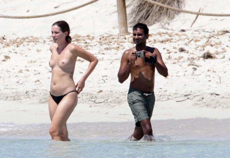 Serena Skov Campbell caught nude by paparazzi with her topless boobs  exposed at the beach with her boyfriend Aziz Ansari. . Rating = 6.89/10