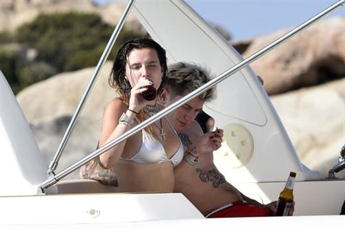 Bella Thorne sexy in a thong bikini drinking and smoking weed out on the water showing off her ass seen by paparazzi.



