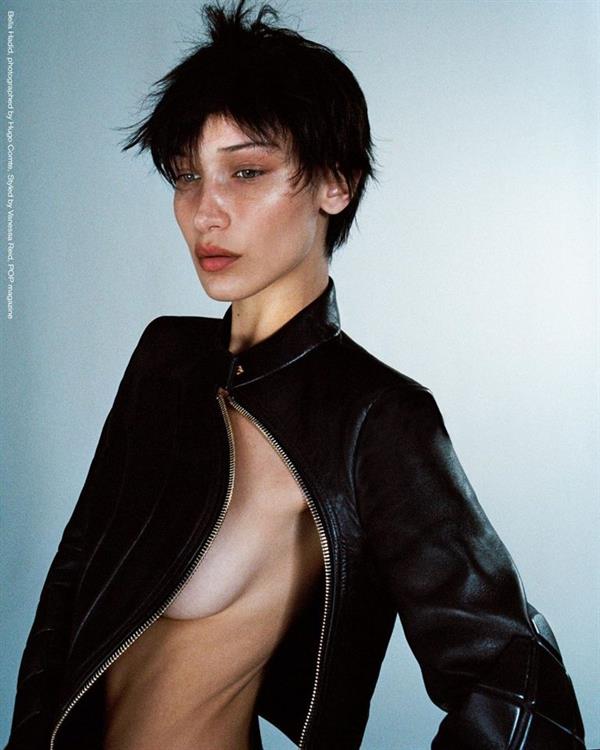 Bella Hadid topless new photo shoot for POP magazine covering her nude boobs with her arms.


