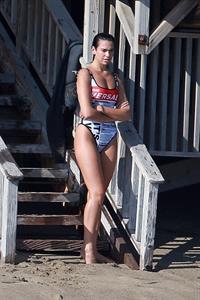 Dua Lipa sexy ass and cleavage in a swimsuit at the beach seen with her boyfriend by paparazzi.














