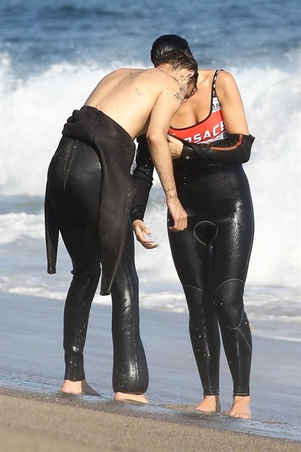 Dua Lipa sexy ass and cleavage in a swimsuit at the beach seen with her boyfriend by paparazzi.













