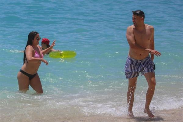 Stassi Schroeder and Katie Maloney-Schwartz sexy at the beach seen by paparazzi in a bikini and a swimsuit showing nice cleavage.