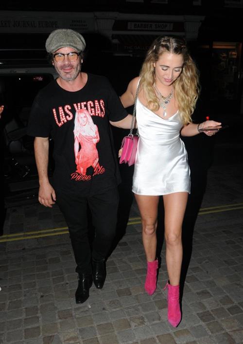 Georgia Harrison Pictures Georgia Harrison upskirt flashing her panties seen by paparazzi getting out of a car in a short dress.
