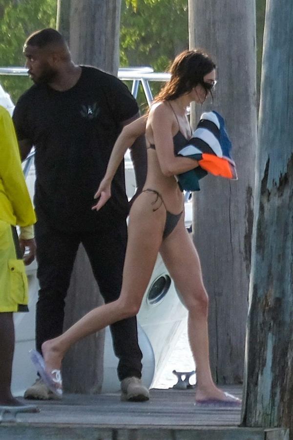 Hailey Bieber, Kendall Jenner and Justine Skye sexy bikini and swimsuit photos seen on a boat drinking for Hailey Bieber's bachelorette party.
