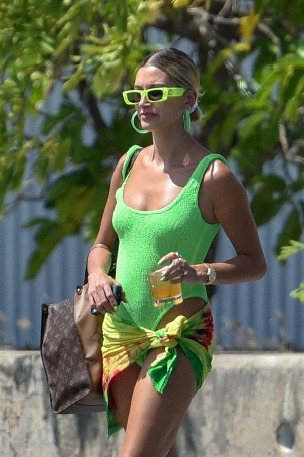 Hailey Bieber, Kendall Jenner and Justine Skye sexy bikini and swimsuit photos seen on a boat drinking for Hailey Bieber's bachelorette party.
