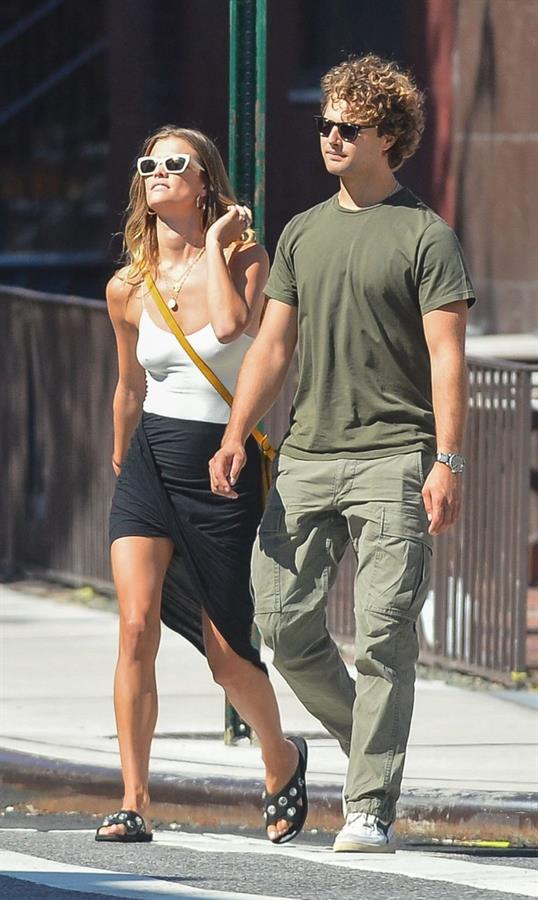 Nina Agdal braless tits pokies in a tight white top seen by paparazzi.















