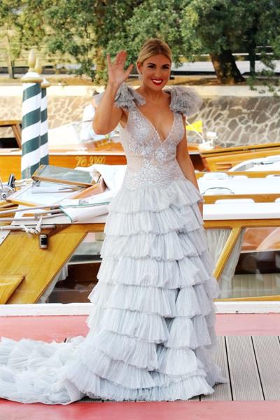 Hofit Golan braless boobs and a see through dress seen by paparazzi.

















