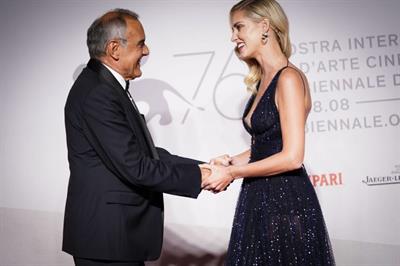 Chiara Ferragni nip slip wardrobe malfunction with her braless boobs accidentally flashing her pierced nipple seen by paparazzi.











