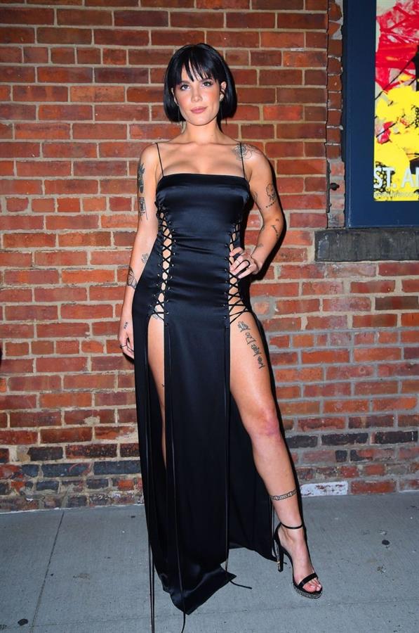 Halsey sexy in a very revealing laced dress seen by paparazzi arriving to DKNY fashion show in New York.






















