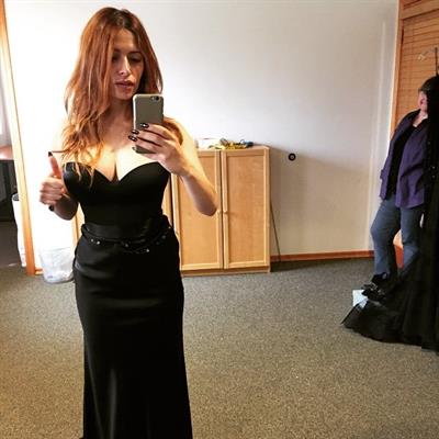 Sarah Shahi taking a selfie