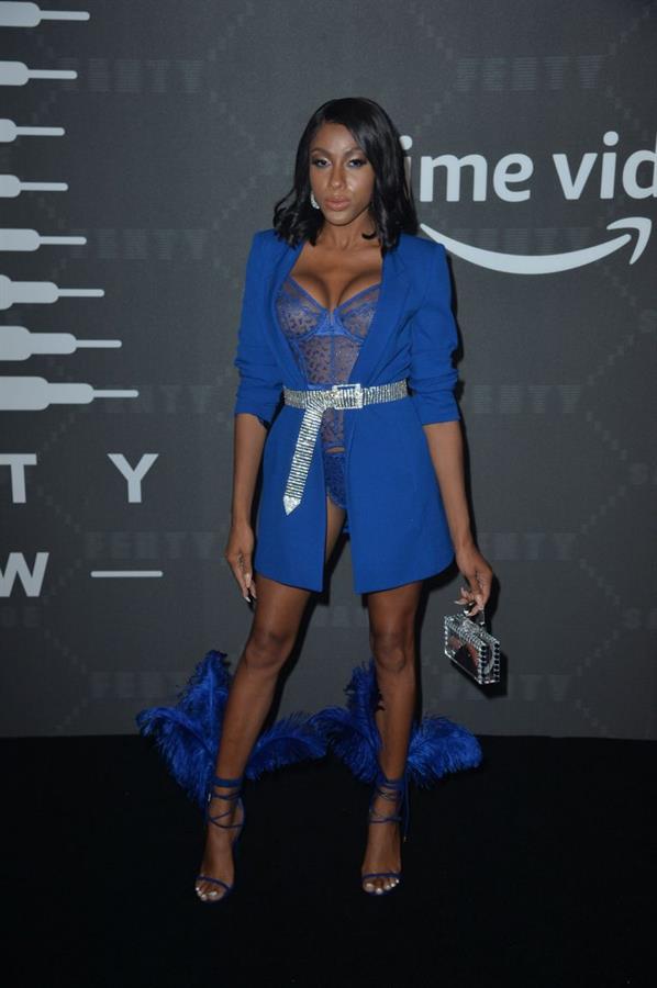 Jayla Koriyan boobs in a see through revealing blue outfit showing off her tits seen by paparazzi at the Savage X Fenty event.










































