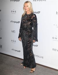 Kate Moss nip slip wardrobe malfunction braless in a see through dress showing off her boobs seen by paparazzi.





















































