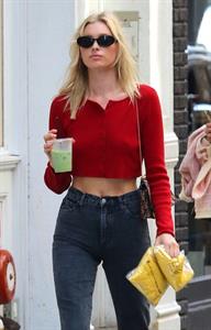Elsa Hosk braless tits pokies in a little red top showing off her tits seen by paparazzi.





