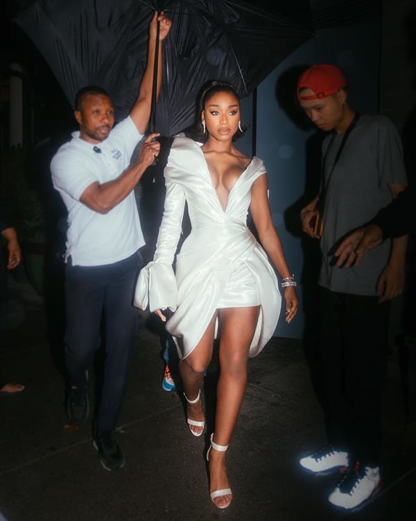 Normani braless boobs in a low cut revealing dress showing off deep cleavage.





















