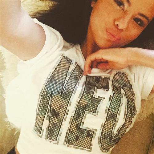 Selena Gomez taking a selfie