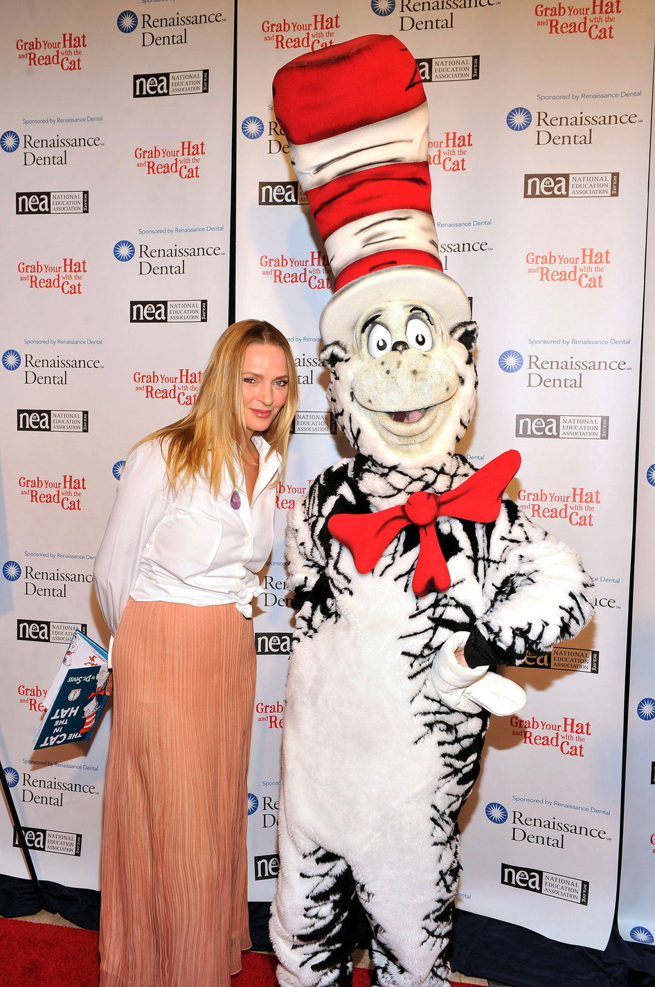 Uma Thurman joins Cat In The Hat On NEA's Read Across America Day at New York Public Library (01.03.0213) 