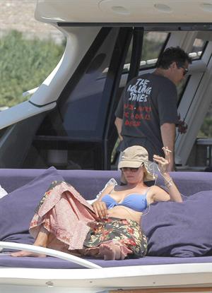Uma Thurman wearing a bikini top on a yacht in St Tropez July 7, 2013 
