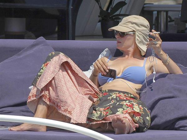 Uma Thurman wearing a bikini top on a yacht in St Tropez July 7, 2013 