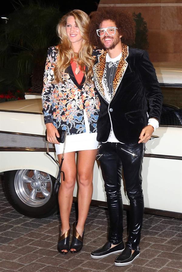 Victoria Azarenka and LMFAO Singer Redfoo arrive for a Player's Party at the IW Club March 7, 2013 