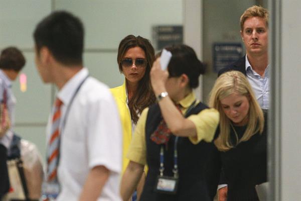 Victoria Beckham - Touches down in Beijing on June 21, 2013