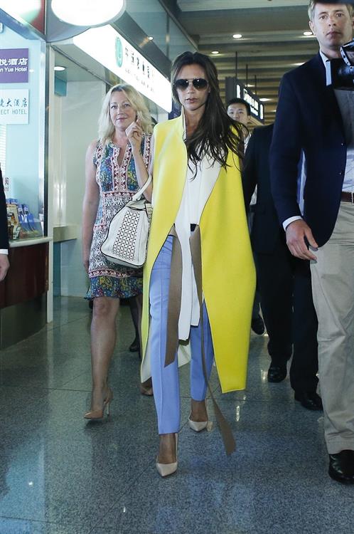 Victoria Beckham Pictures Victoria Beckham - Touches down in Beijing on June 21, 2013