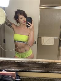 Leah Winters in a bikini taking a selfie