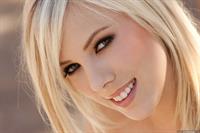 Bibi Jones removes her shirt and skirt
