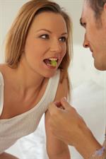 All natural redhead Alisson is enjoying a morning in bed with her man. The fiery babe lets her beau suck on her small tits, then rewards him with a lingering blowjob and takes advantage of his position to climb aboard and take him deep in her landing strip pussy cowgirl style. After a wild ride, Alisson finally reaches her climax and then helps her man to cum all over her flat tanned belly to complete their raunchy fuck fest.