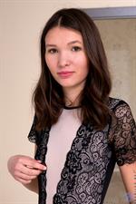 After exploring the contents of her closet, Ariel Tylor decides the best outfit she can wear is nothing at all. She peels off her body suit and lets her fingers walk their way down her body, from her tiny beasts and tightly budded nipples to the slippery delight of her bald fuck hole. 