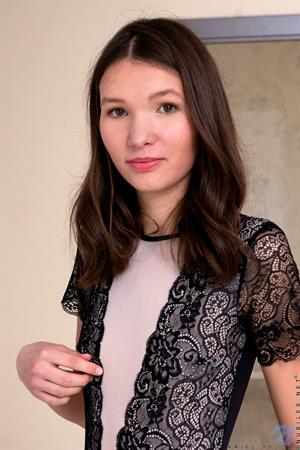 After exploring the contents of her closet, Ariel Tylor decides the best outfit she can wear is nothing at all. She peels off her body suit and lets her fingers walk their way down her body, from her tiny beasts and tightly budded nipples to the slippery delight of her bald fuck hole. 