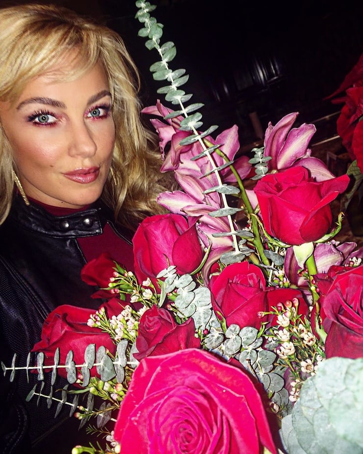 Amber Nichole Miller taking a selfie