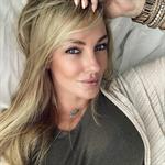 Amber Nichole Miller taking a selfie