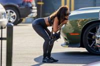 Vanessa Hudgens seen by paparazzi on her way to the gym showing her hot model body wearing a sports bra and sexy ass in tight workout pants.